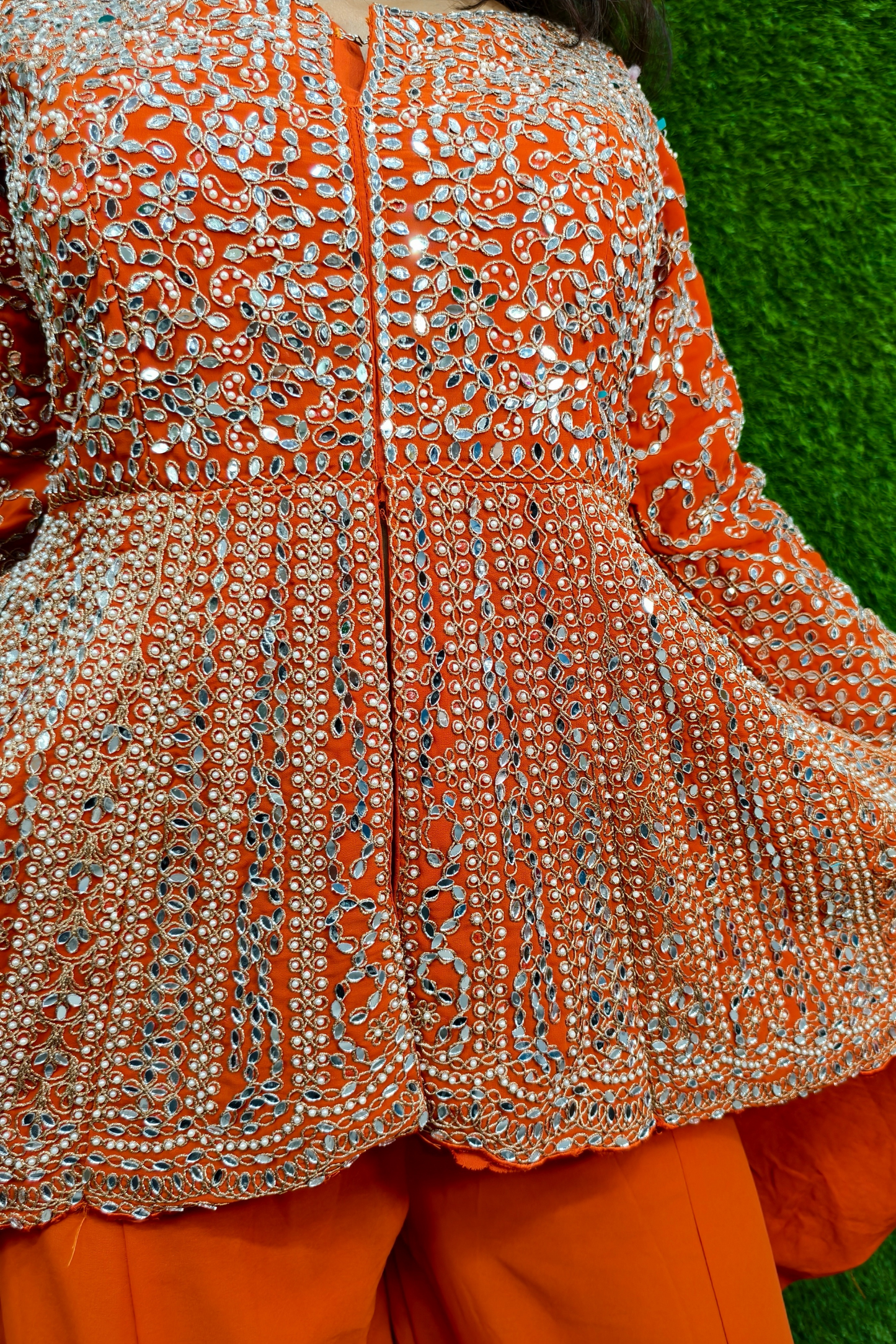 Mirror work Tail Cut Sharara suit in Orange.