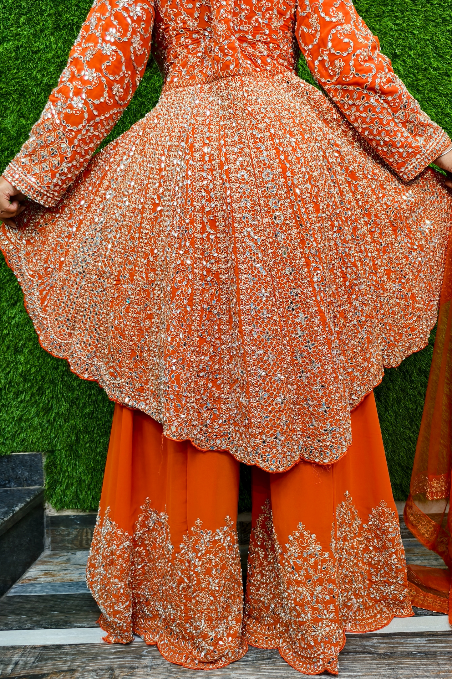Mirror work Tail Cut Sharara suit in Orange.