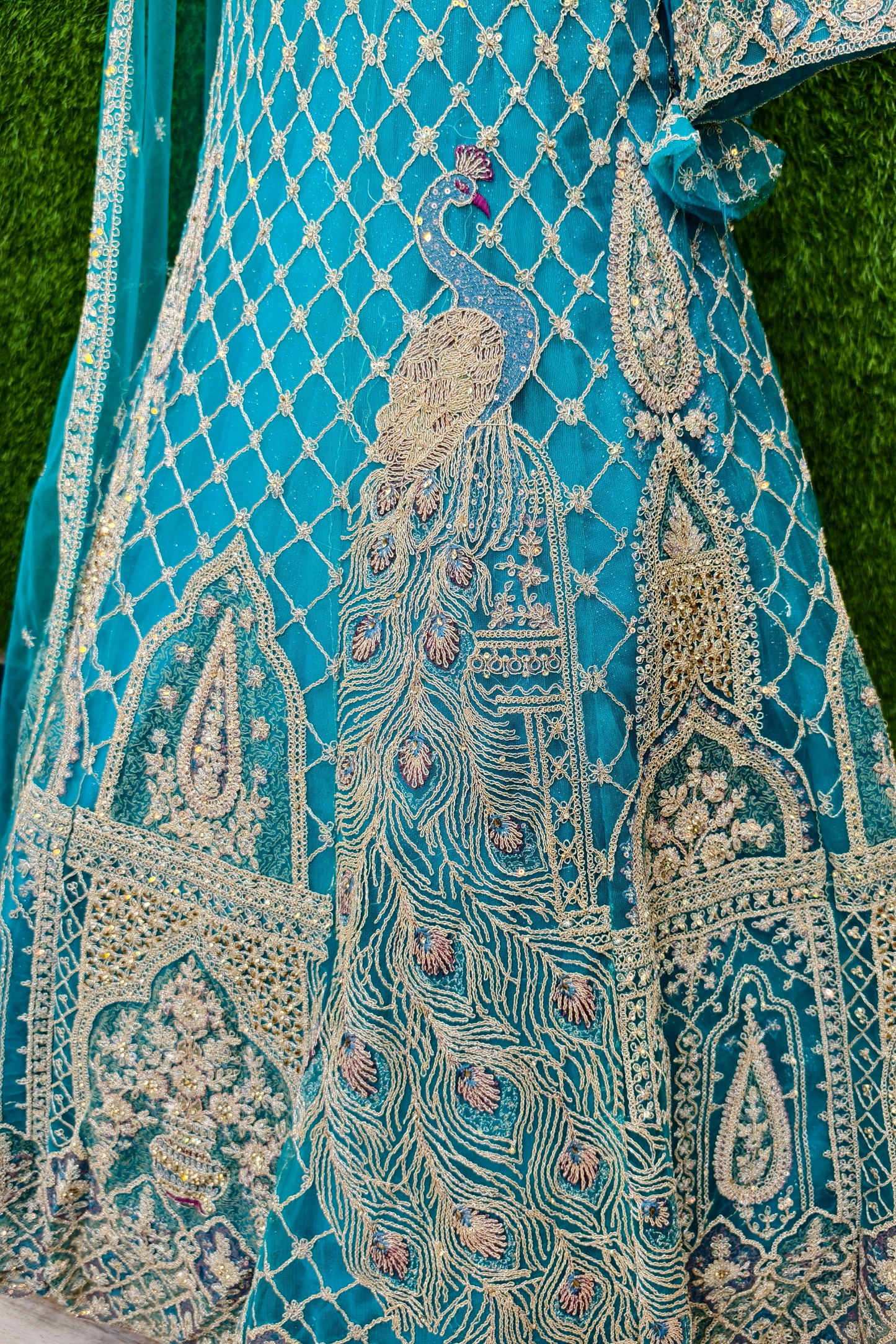 Beautiful Hand Embroidered Lehenga Choli on Silk Net.
