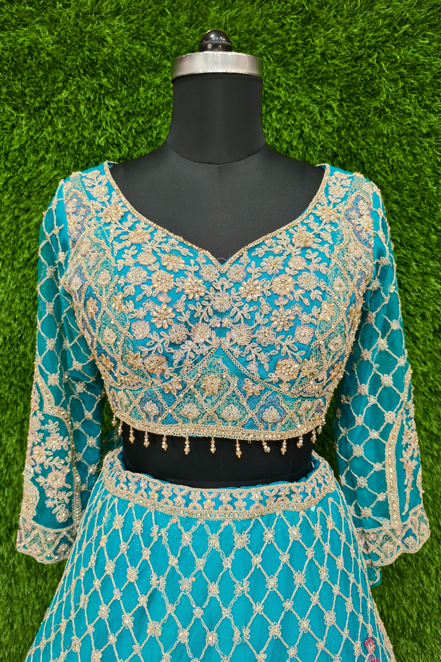 Beautiful Hand Embroidered Lehenga Choli on Silk Net.