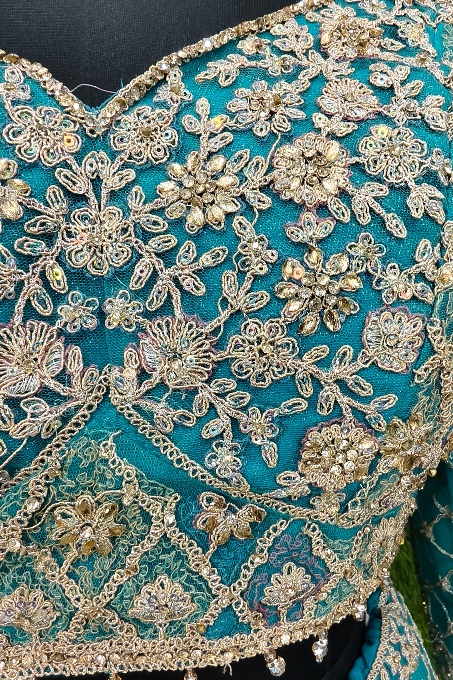 Beautiful Hand Embroidered Lehenga Choli on Silk Net.