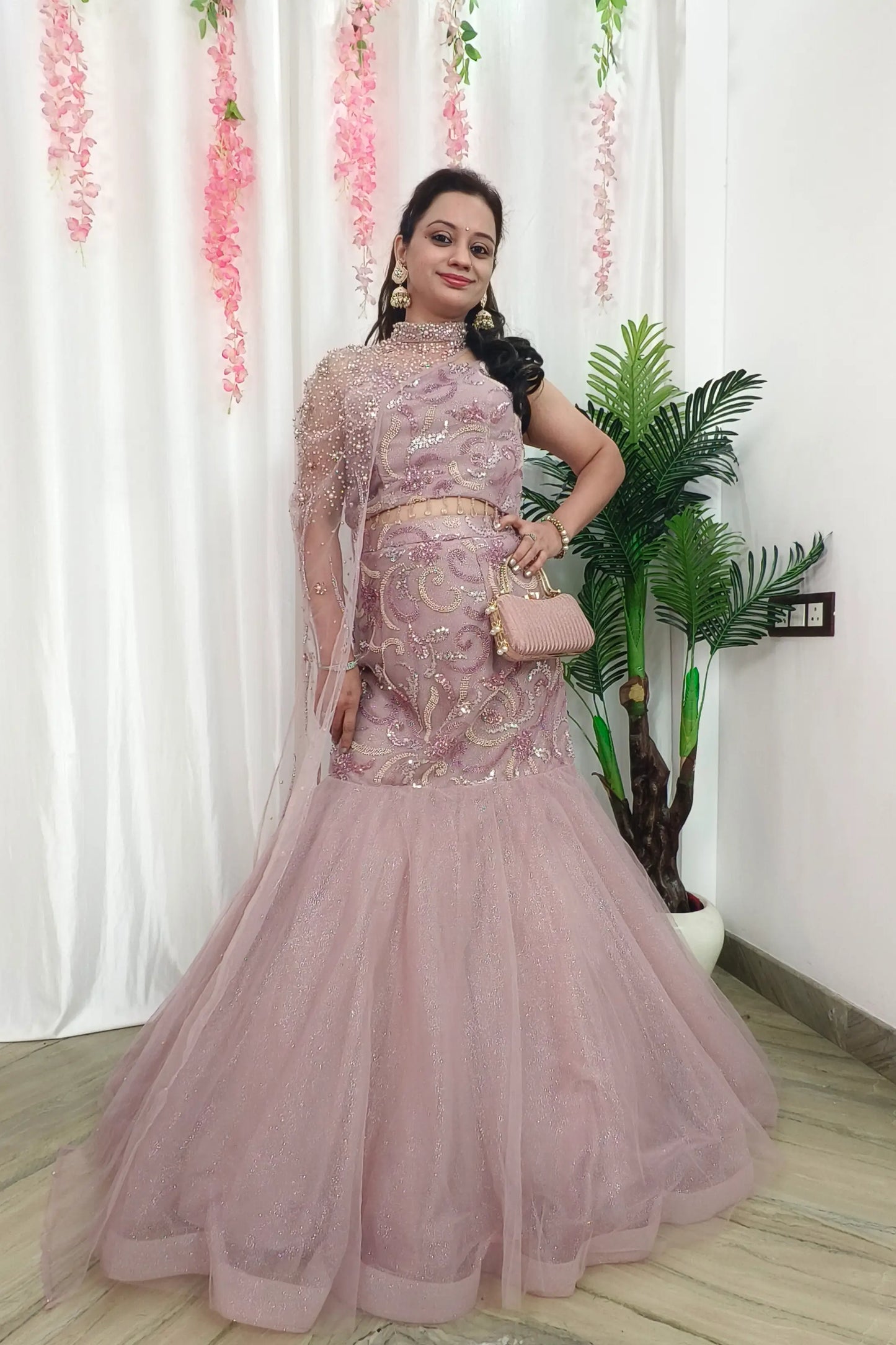 Beautiful Fish Cut Lehenga Dress With Pearl Necklace Designing In Pink Pastel Shade