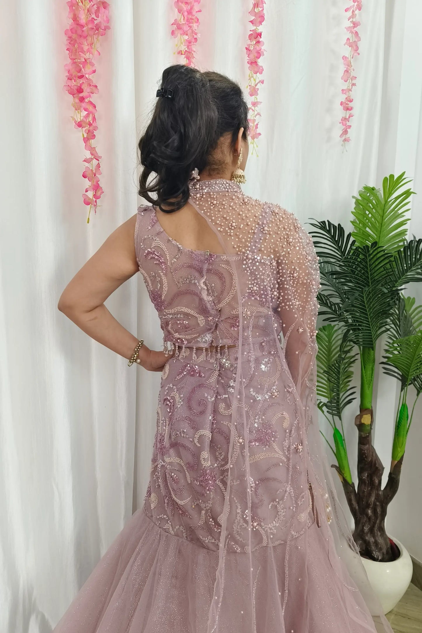 Beautiful Fish Cut Lehenga Dress With Pearl Necklace Designing In Pink Pastel Shade