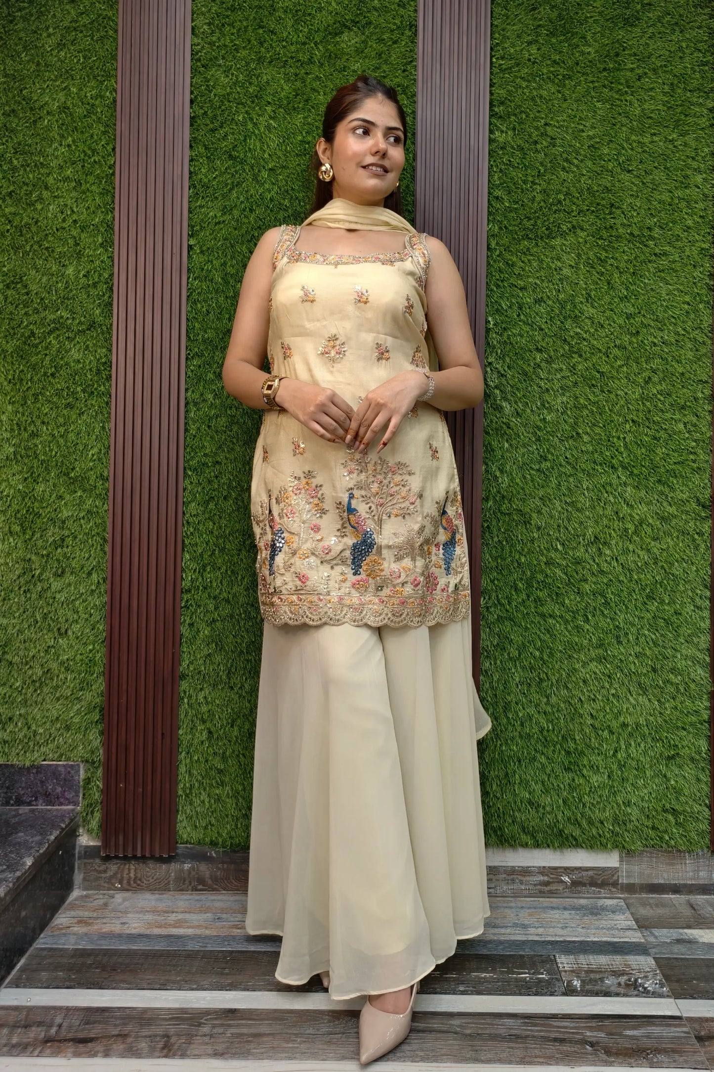 Pure Chinnon Silk Embroidered Sharara Suit In Light Gold