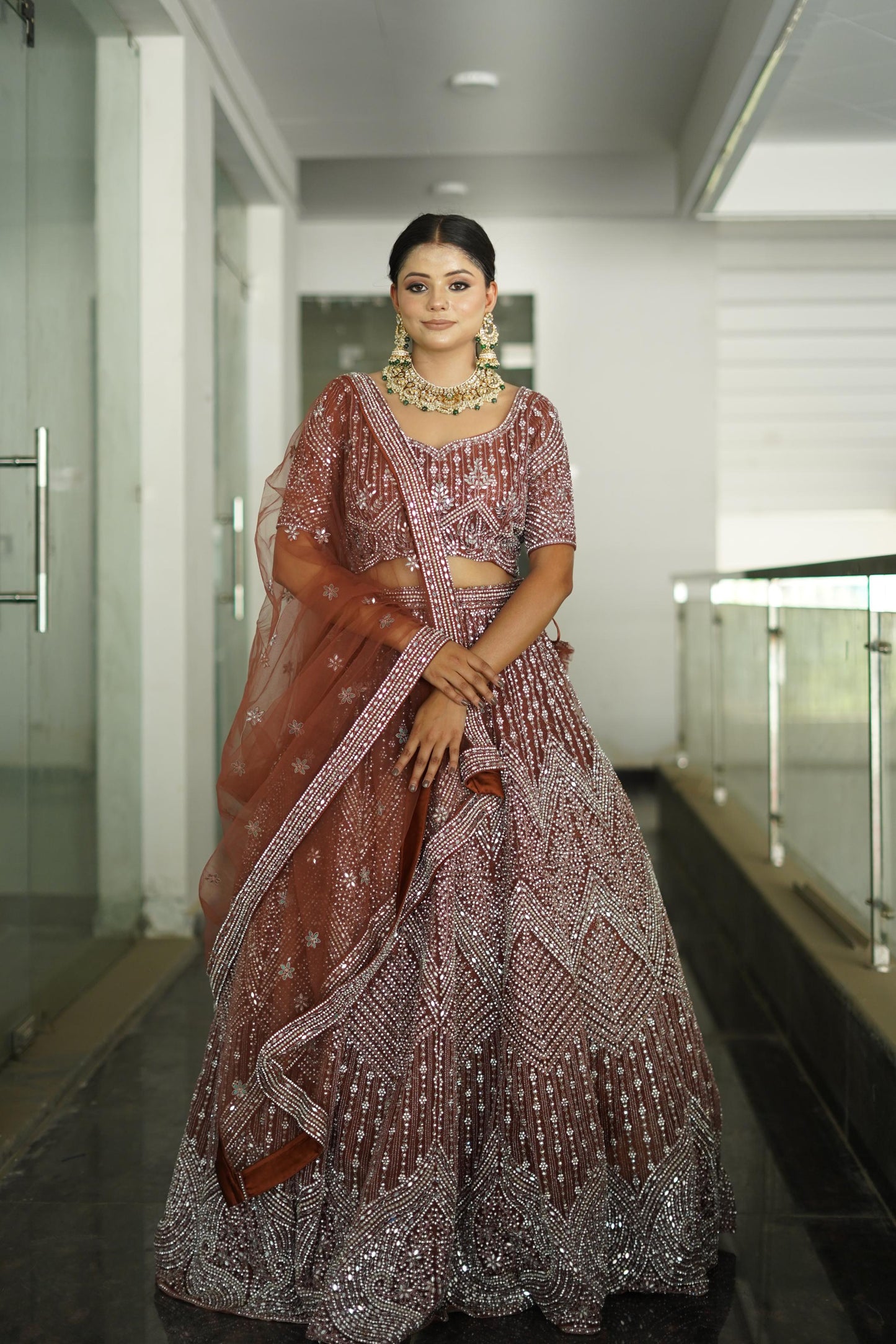 Heavy Embroidered Anarkali lehenga On Net In Beautiful Rust Shade