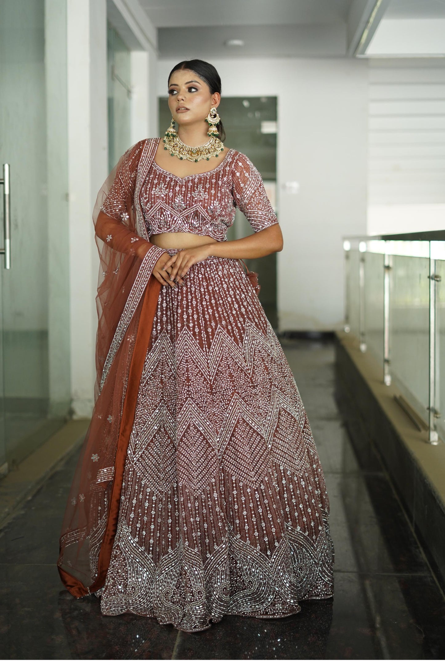 Heavy Embroidered Anarkali lehenga On Net In Beautiful Rust Shade