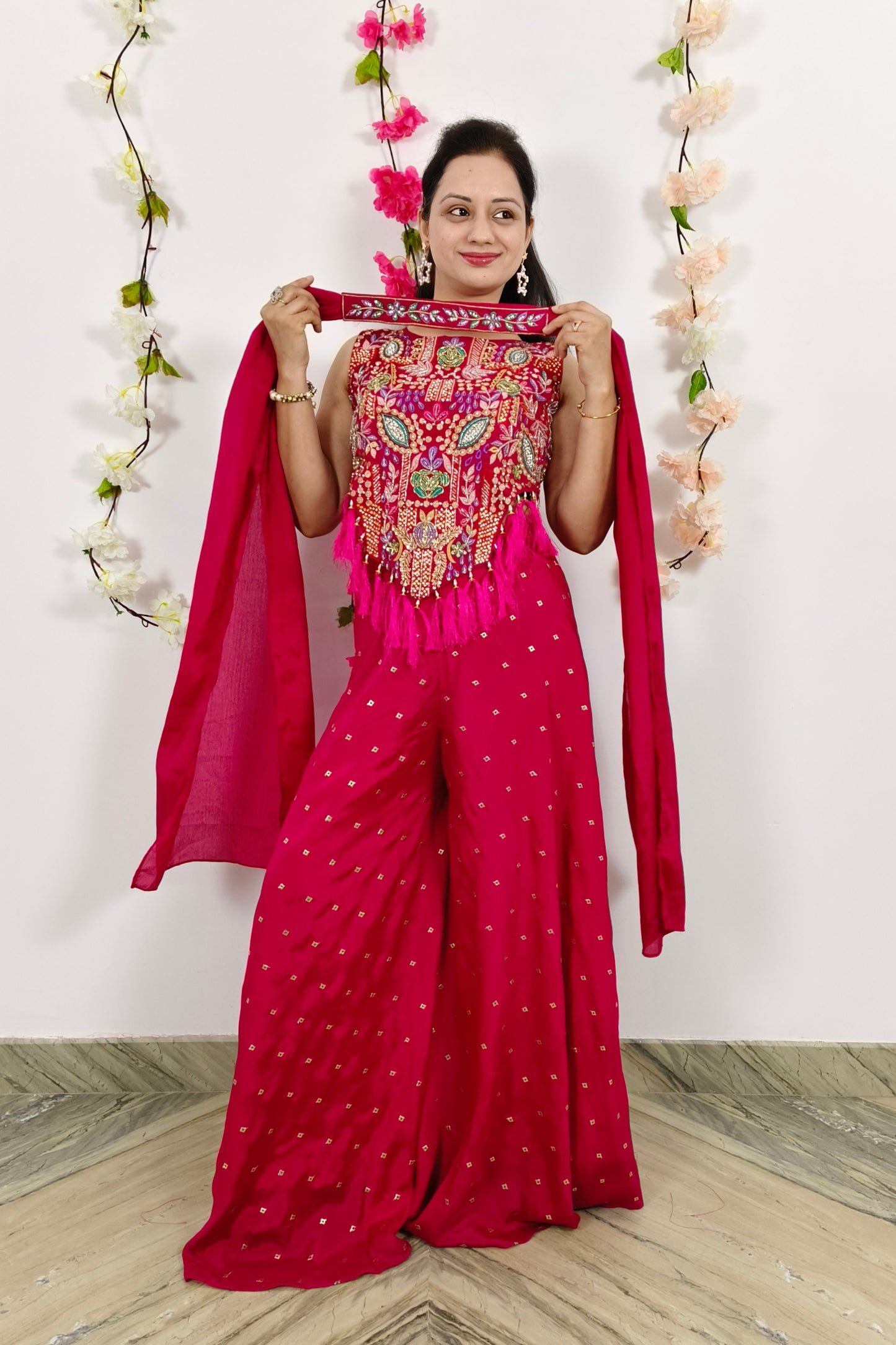 Trendy Hemline Designer Crop Top Sharara In Rani With Tassles Work