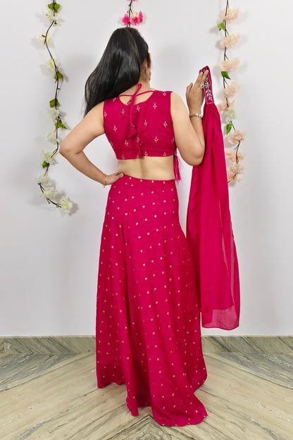 Trendy Hemline Designer Crop Top Sharara In Rani With Tassles Work