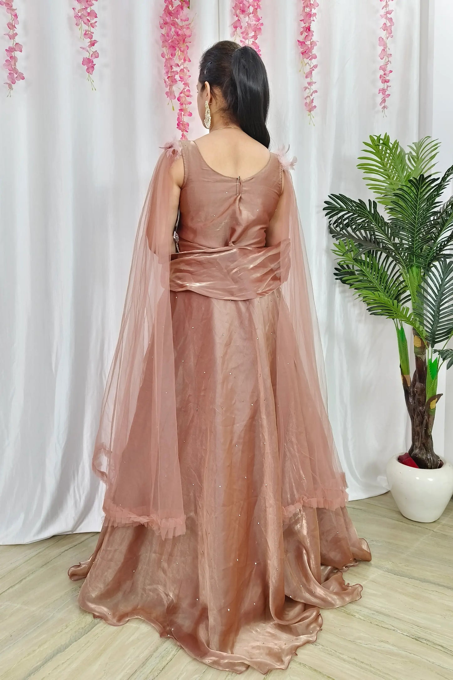 Designer Feather Sleeves Partywear Organza Gown In Mettalic Brown Colour