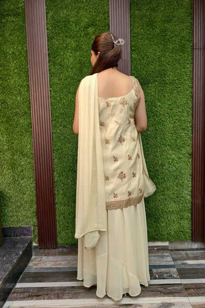 Pure Chinnon Silk Embroidered Sharara Suit In Light Gold