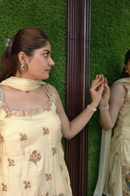 Pure Chinnon Silk Embroidered Sharara Suit In Light Gold