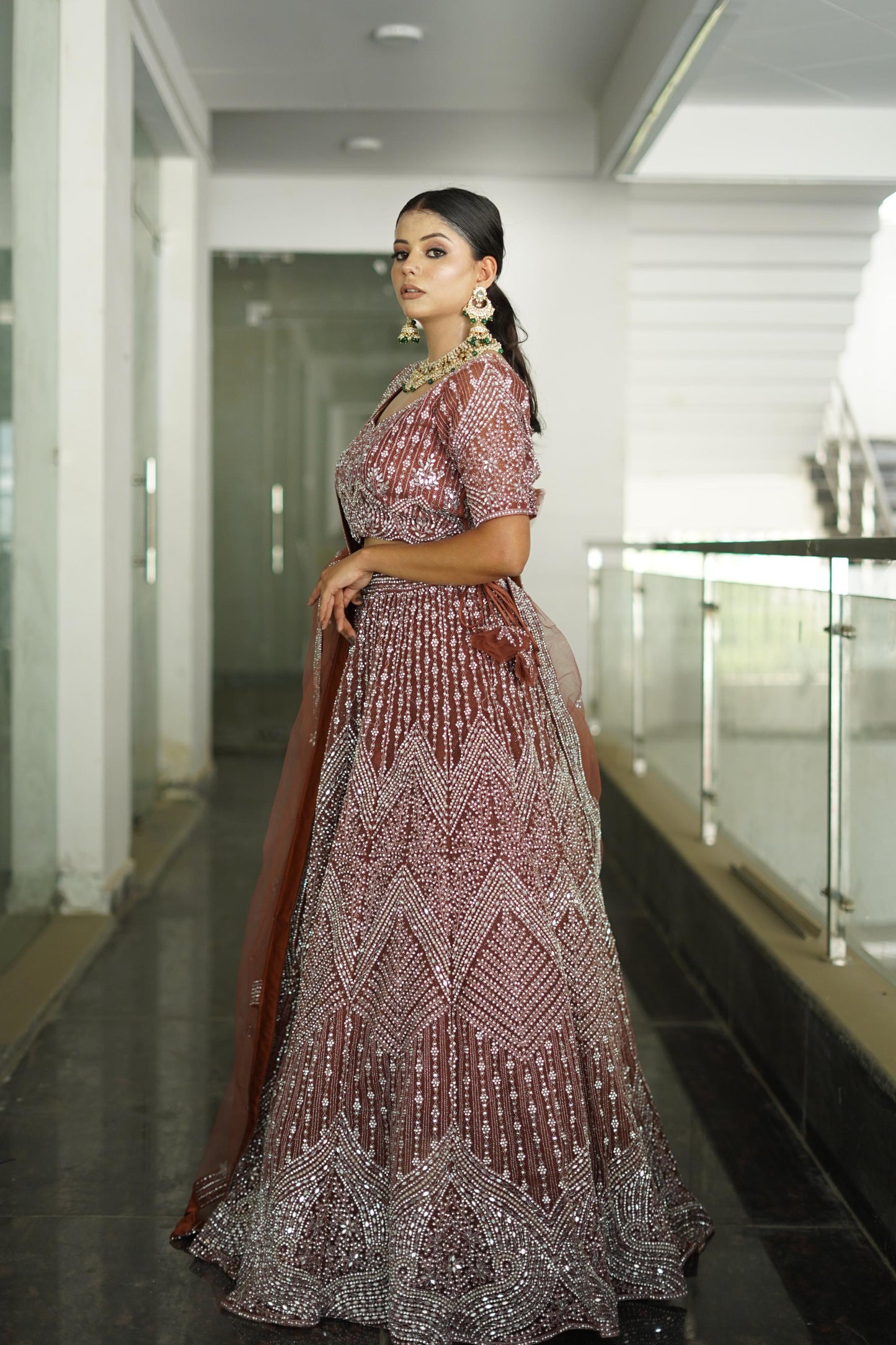 Heavy Embroidered Anarkali lehenga On Net In Beautiful Rust Shade