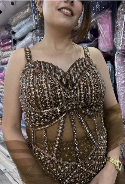 Hand Embellished Fish Cut Lehenga with Corset Style Choli and Embroidered Net Dupatta