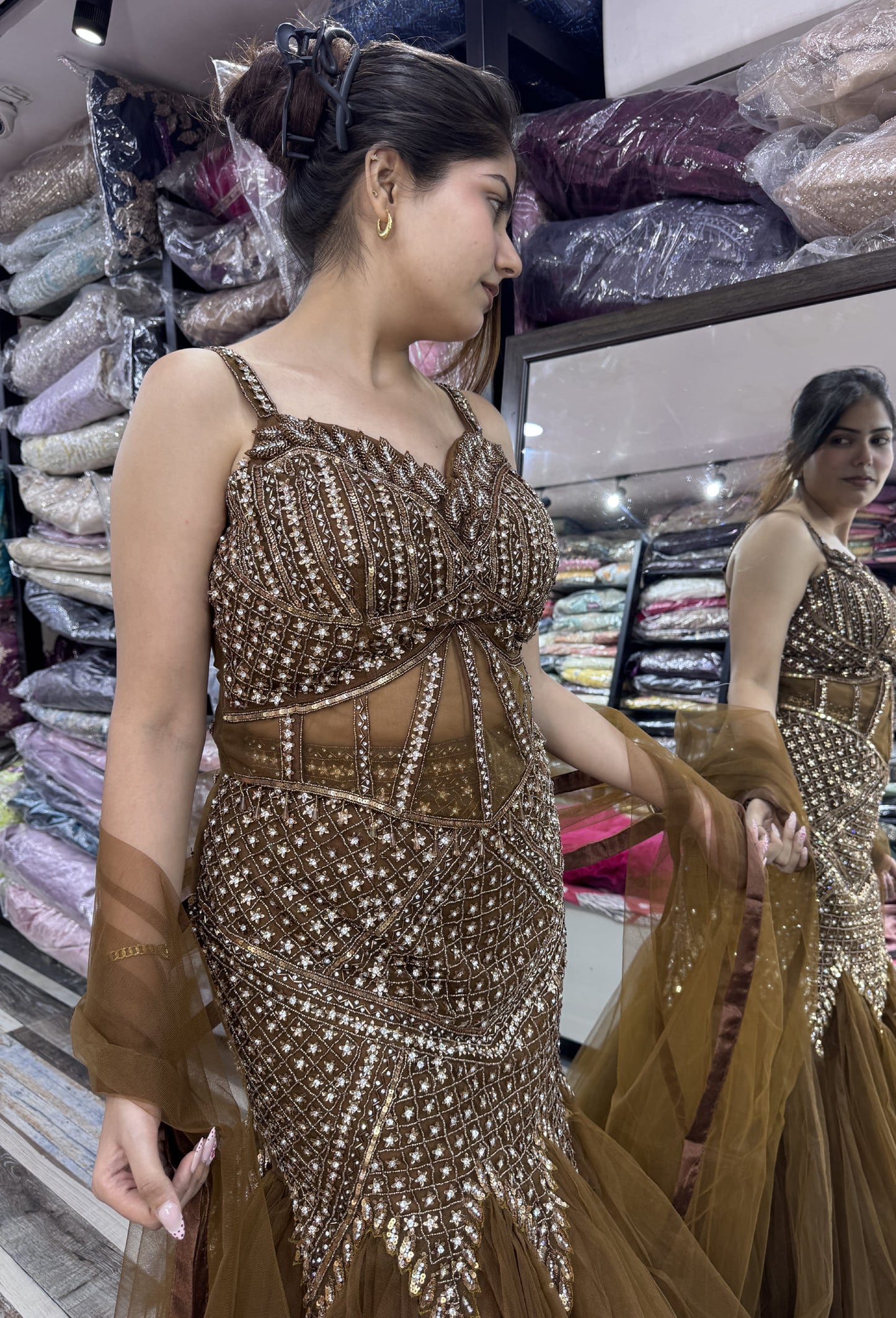 Hand Embellished Fish Cut Lehenga with Corset Style Choli and Embroidered Net Dupatta