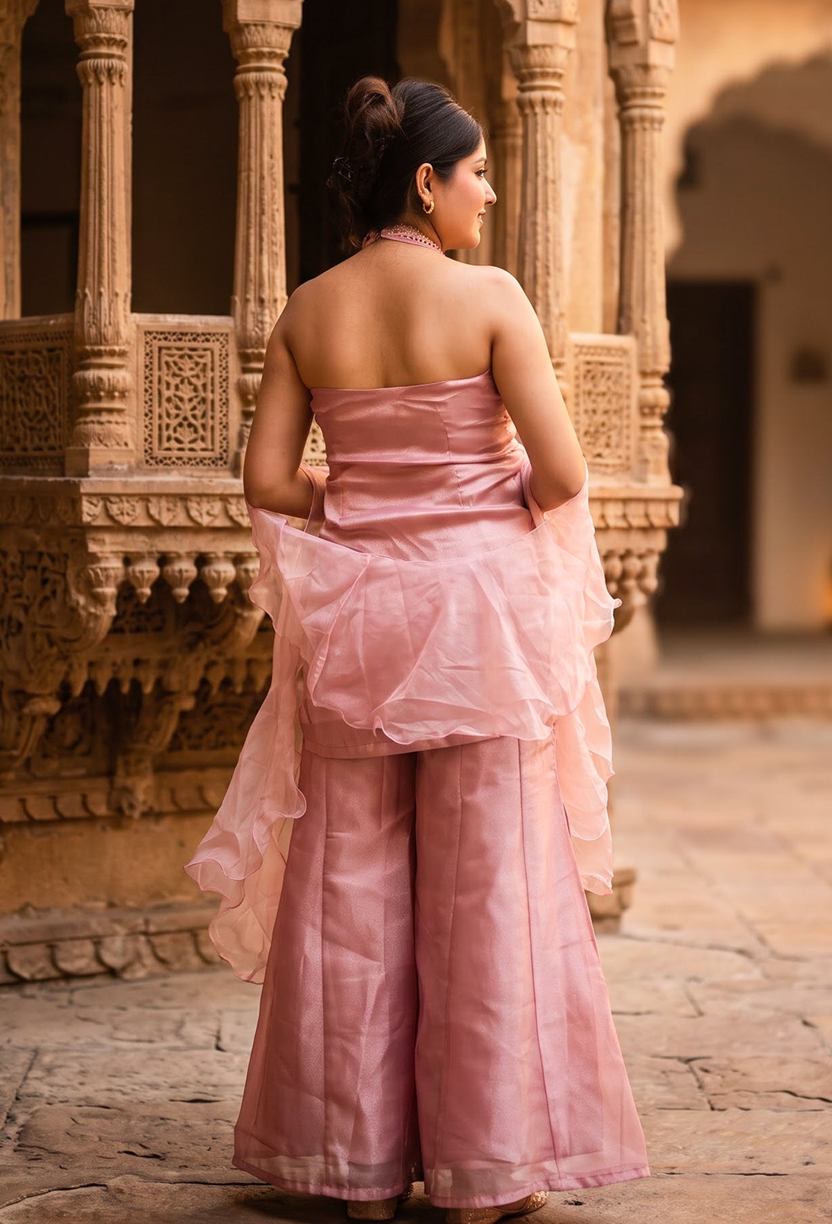 Organza Silk Halter Neck Sharara Suit with Stone Work & Ruffle Dupatta