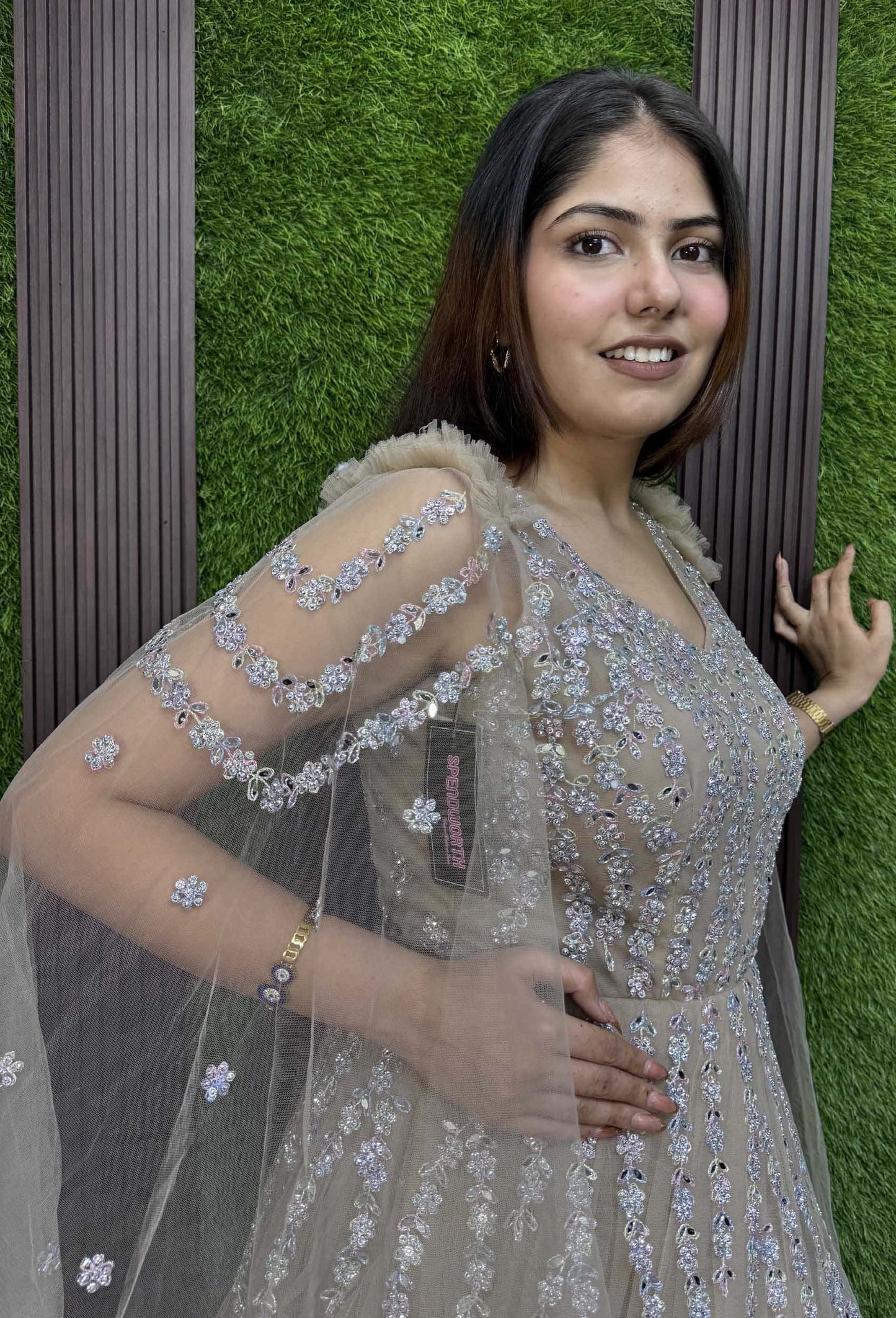 Multi-Embroidered Partywear Gown with Elegant Long Sleeve Design