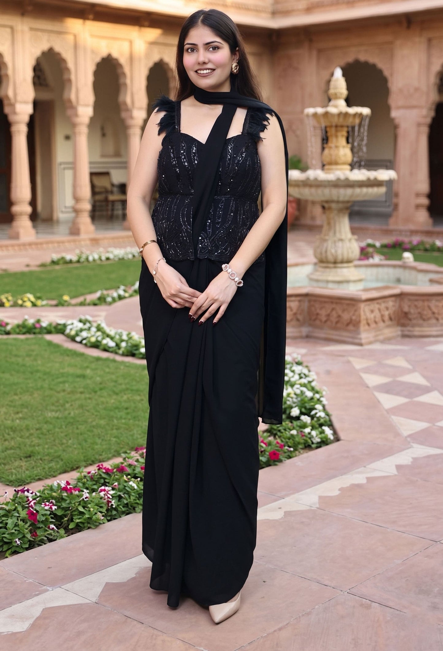 Peplum Style Drape Dress with Hand Work Blouse and Feather Design Spaghetti Straps in Georgette