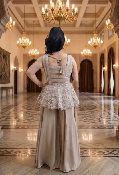 Circular Peplum Net Top and Chinnon Silk Plazo Cord Set