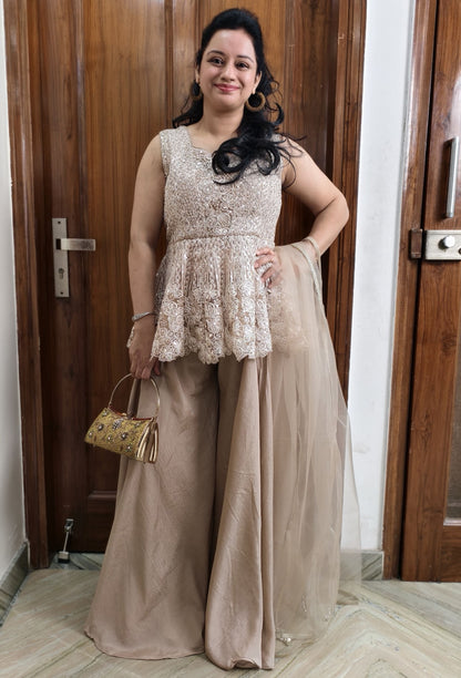 Circular Peplum Net Top and Chinnon Silk Plazo Cord Set