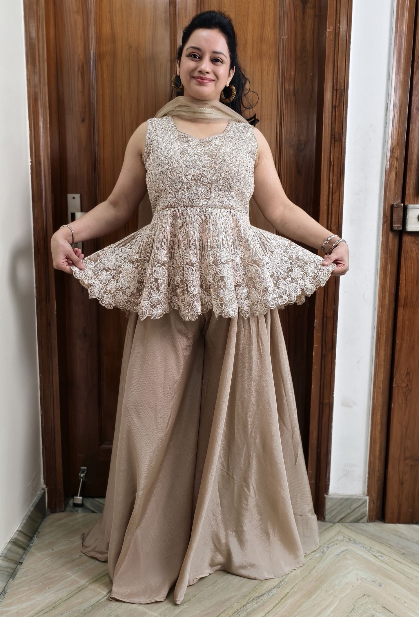 Circular Peplum Net Top and Chinnon Silk Plazo Cord Set