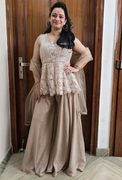 Circular Peplum Net Top and Chinnon Silk Plazo Cord Set