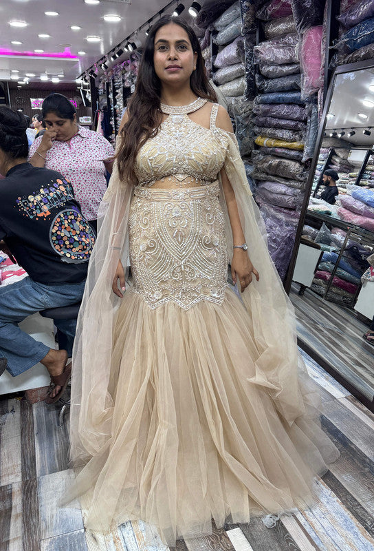 Stylish Hand Embellished Mesh Net Fish Cut Lehenga & Falling Cape Sleeves with Halter Neck Blouse