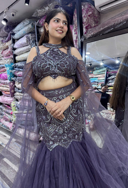 Stylish Hand Embellished Mesh Net Fish Cut Lehenga & Falling Cape Sleeves with Halter Neck Blouse