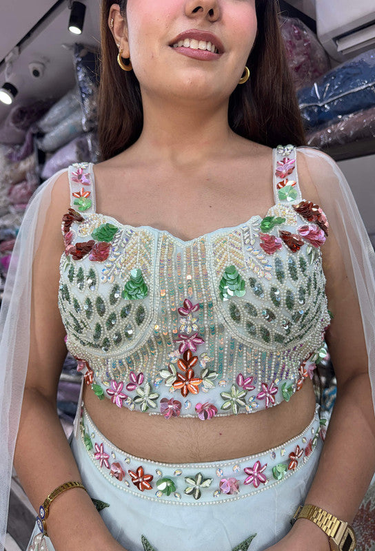 Stylish Sky Blue Hand Embellished Pearl Beadwork Lehenga Choli with Connected Falling Sleeves